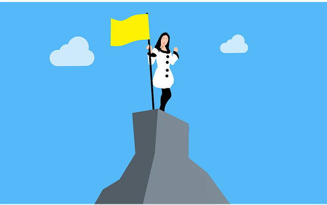 Cartoon of woman with flag on top of mountain